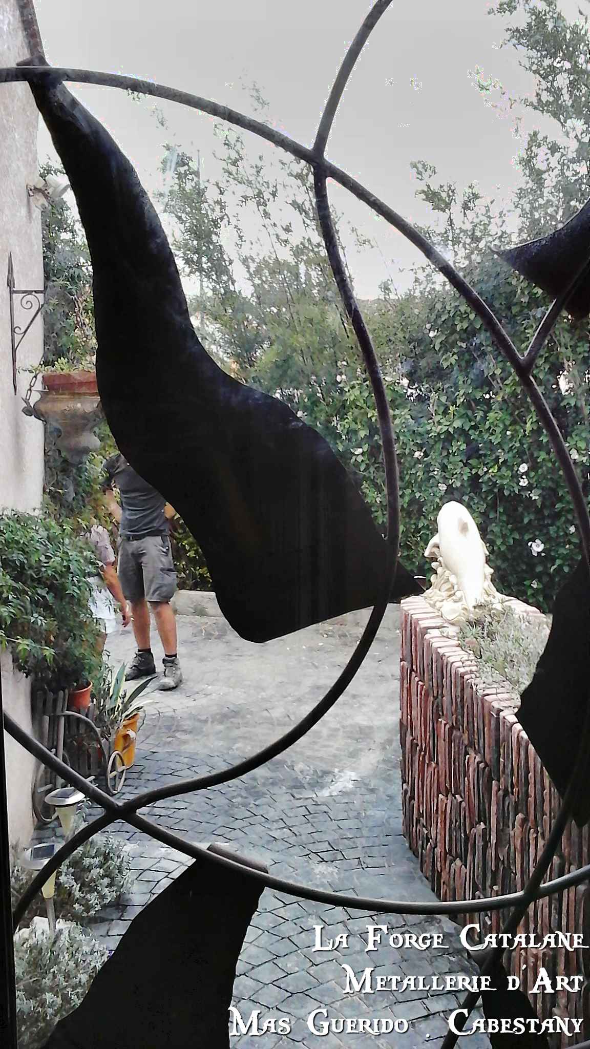 porte entree vitree rondin decoupe laser La Forge Catalane Cabestany (4).jpg